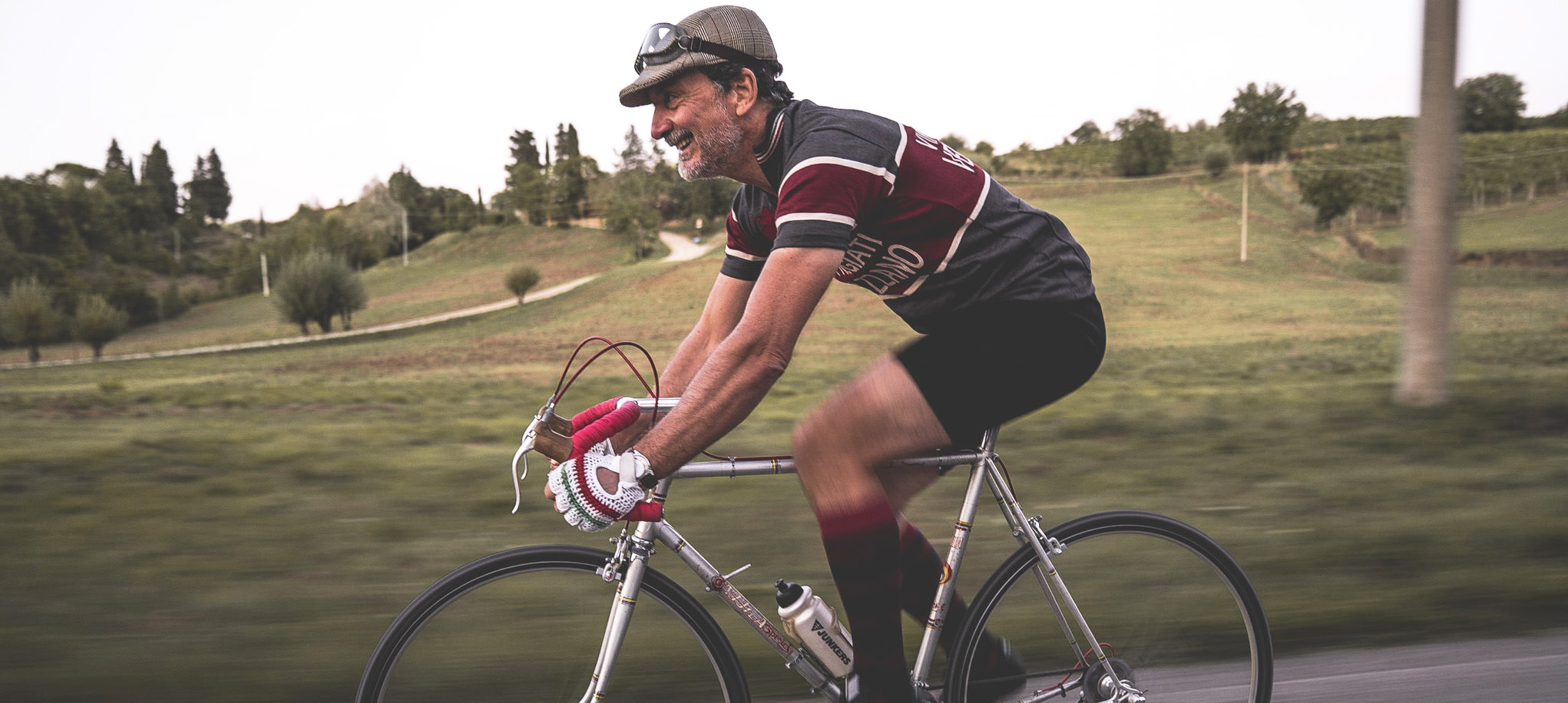 Italien-WEin-Toskana-Chianti-Weingut-Castello di Verrazzano- Luigi Cappellini auf dem Rennrad im Chianti beim Eroica-Radrennen